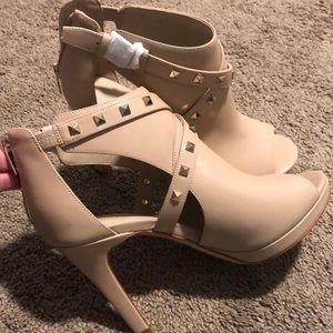 Never worn High Heels with studs